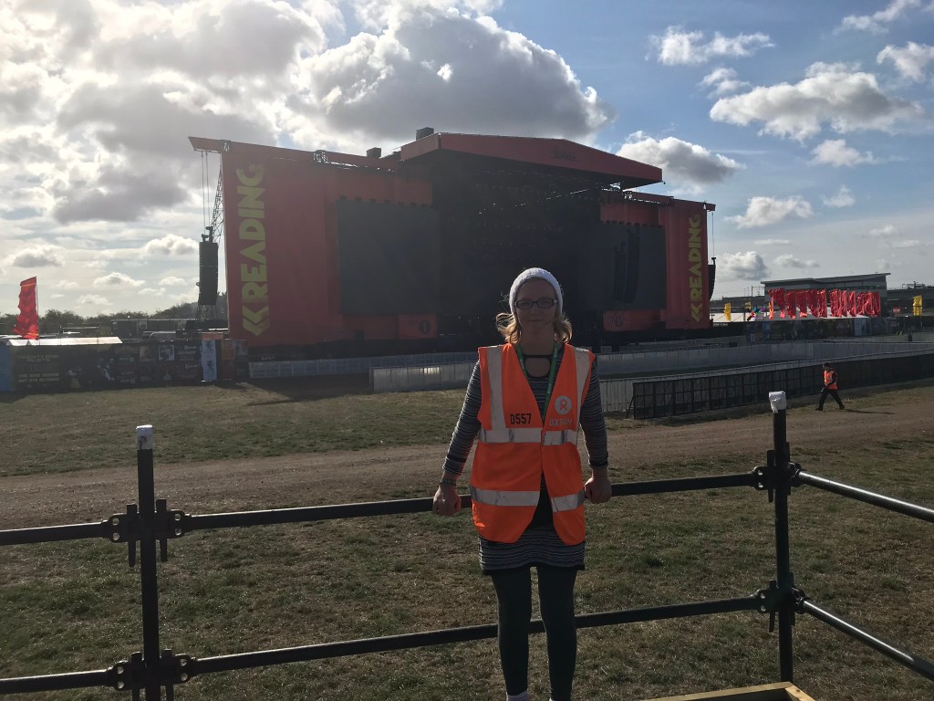 Me in my hi-vis tabard on the main stage accessibility platform at Reading 2018